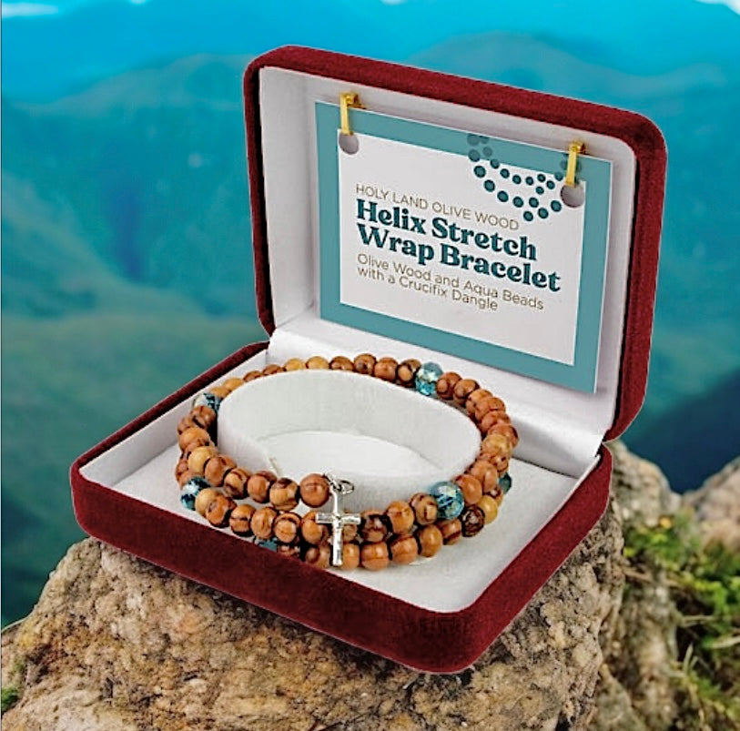 HELIX STRETCH WRAP BRACELET WITH OLIVE WOOD AND AQUA BEADS AND CRUCIFIX DANGLE IN VELVET BOX